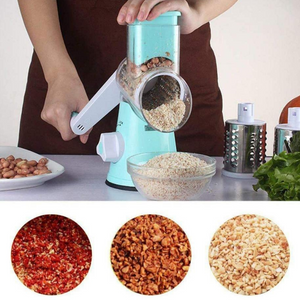 Manual grater with three interchangeable rollers